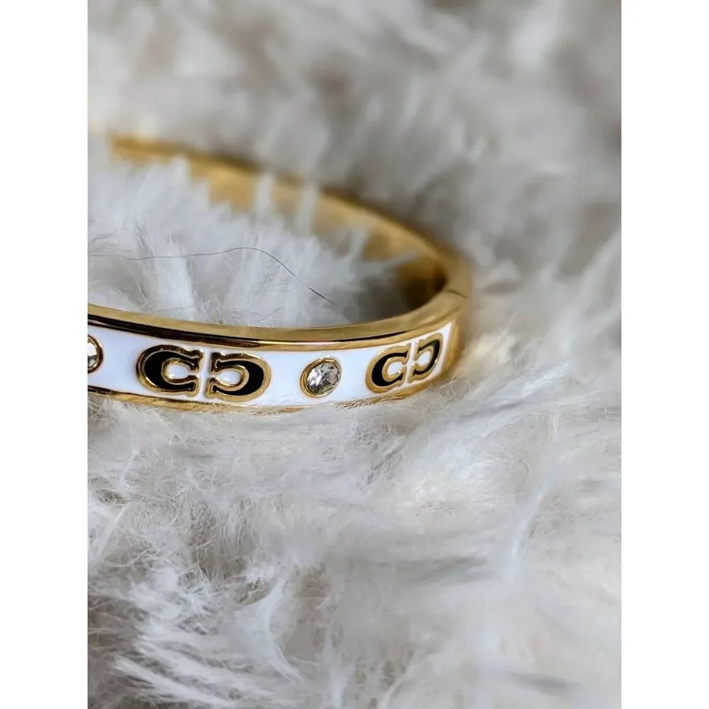 COACH Signature White Gold Crystal Hinge Bangle Bracelet